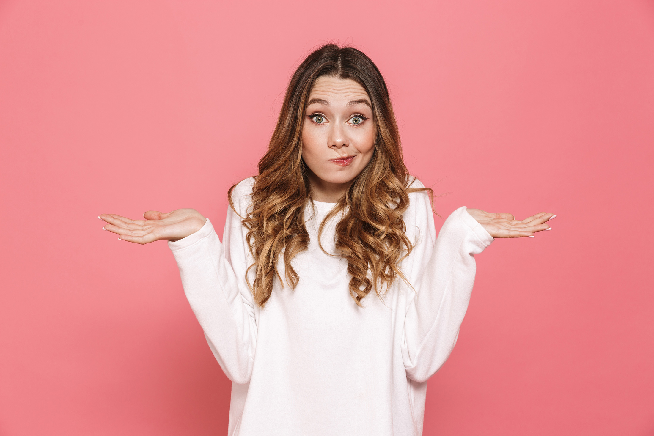 woman shrugging with curiosity