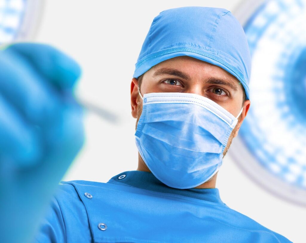 plastic surgeon with scrubs and face mask